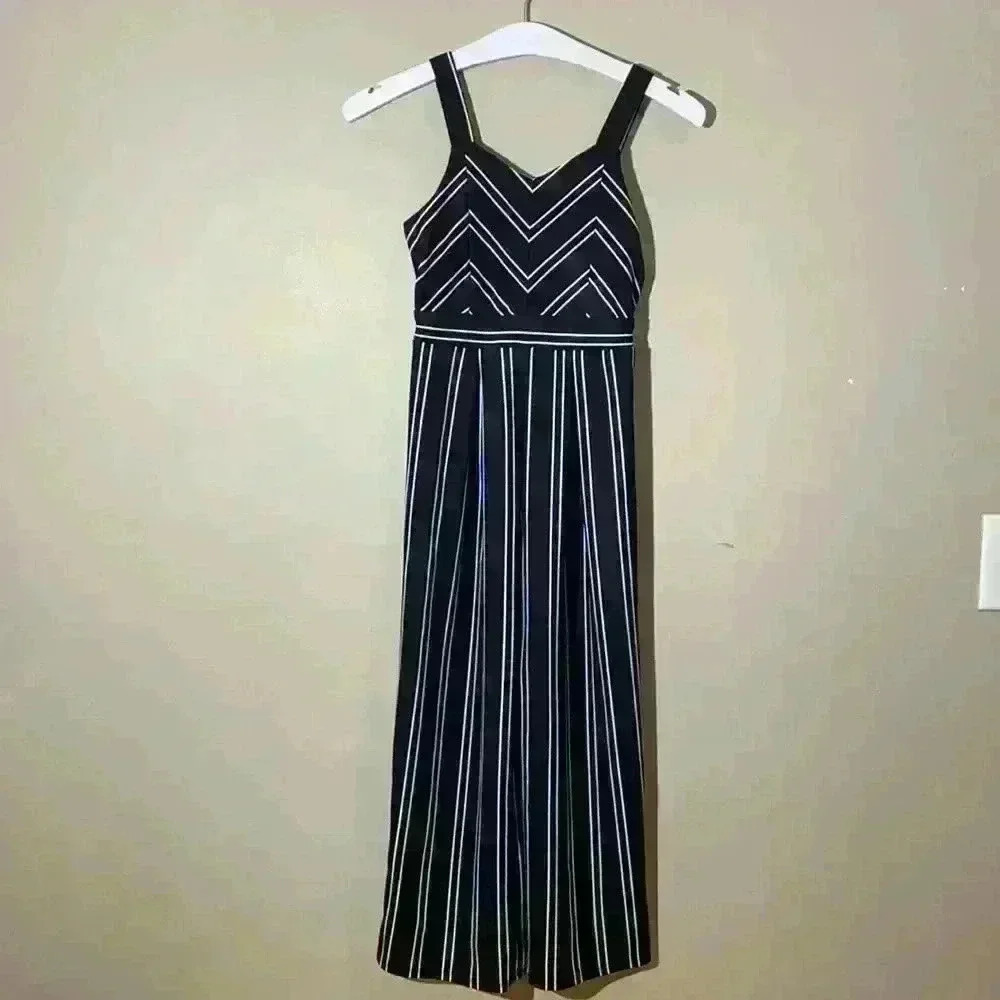 Girls Jumpsuit, black and white striped, size 7